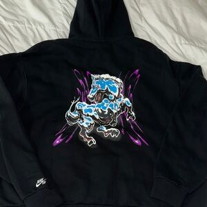 Nike Black Hoodie with Vibrant Blue and Purple Design